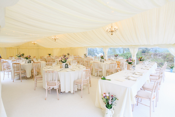 tented wedding reception, photo by Sansom Photography | via junebugweddings.com