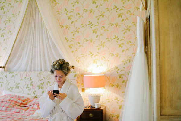 bride getting ready, photo by Sansom Photography | via junebugweddings.com