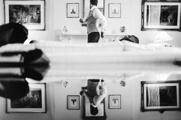 groom getting ready, photo by Sansom Photography | via junebugweddings.com