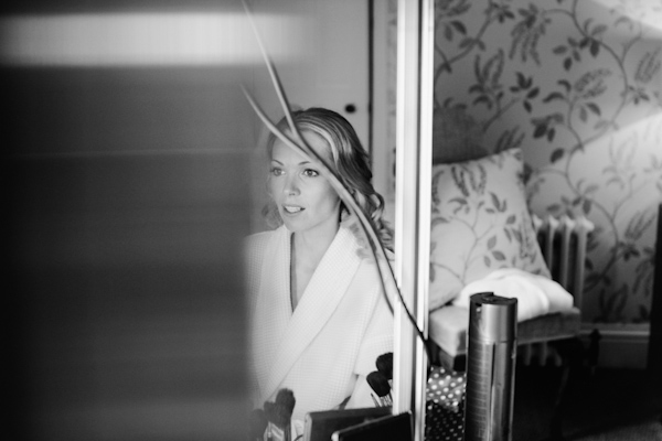 bride getting ready, photo by Sansom Photography | via junebugweddings.com