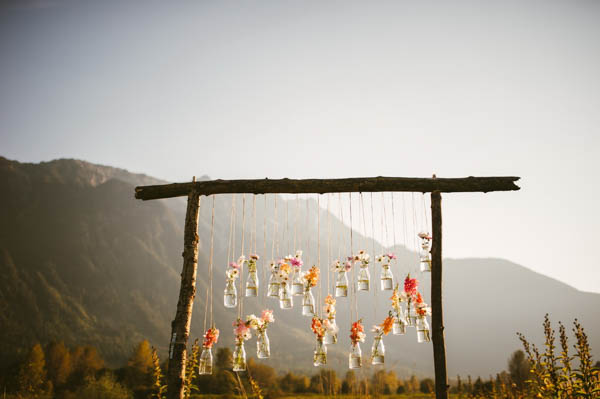 gorgeous hanging floral ceremony arch