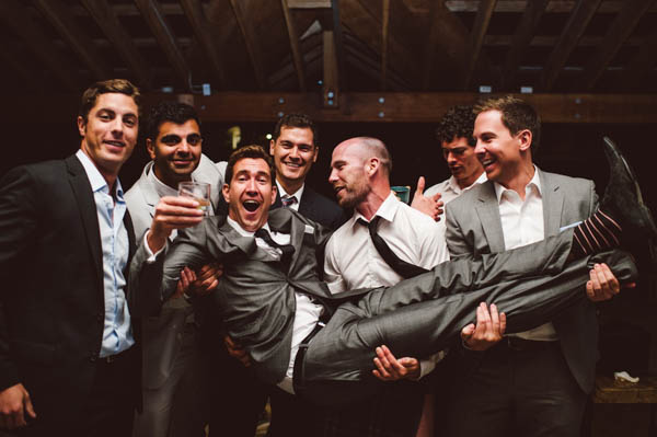 groom and his groomsmen reception fun