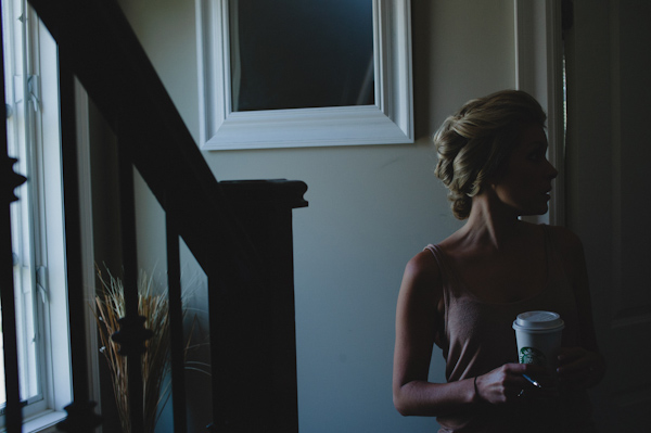 bride getting ready, photo by Aron Goss | via junebugweddings.com