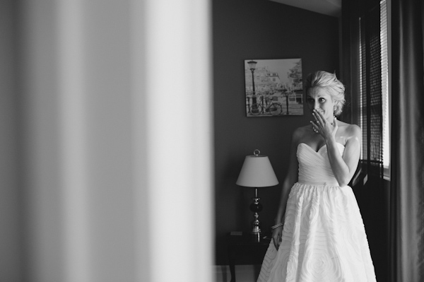 bride getting ready, photo by Aron Goss | via junebugweddings.com