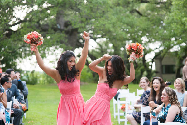 lively bridal party dancing down the aislelively bridal party dancing down the aisle