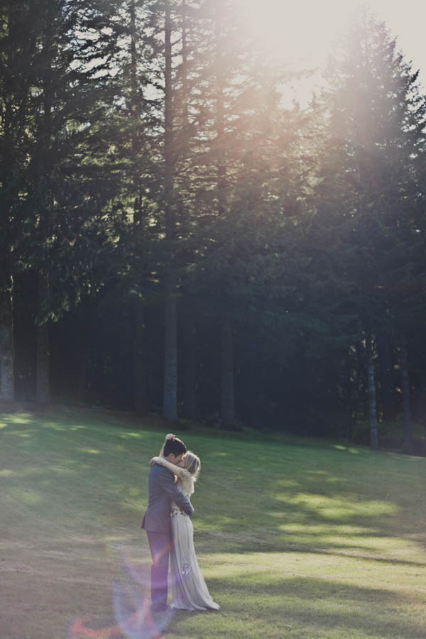 couple's portrait with tall trees