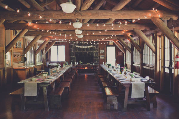 romantic camp wedding reception decor with lights