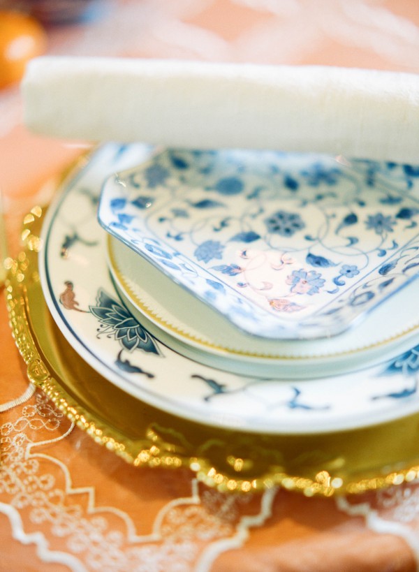 gold and blue table setting