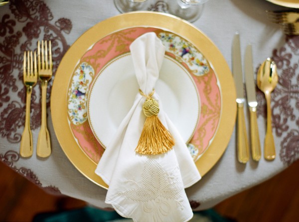 gold pink and blue place setting