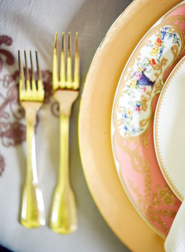 gold pink and blue place setting