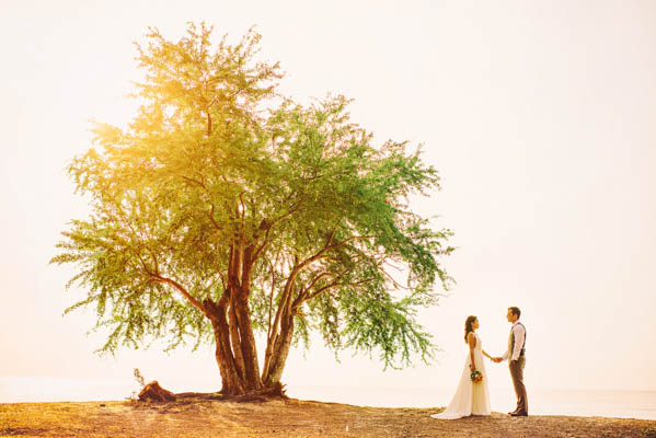 beautiful couple's portrait with tree