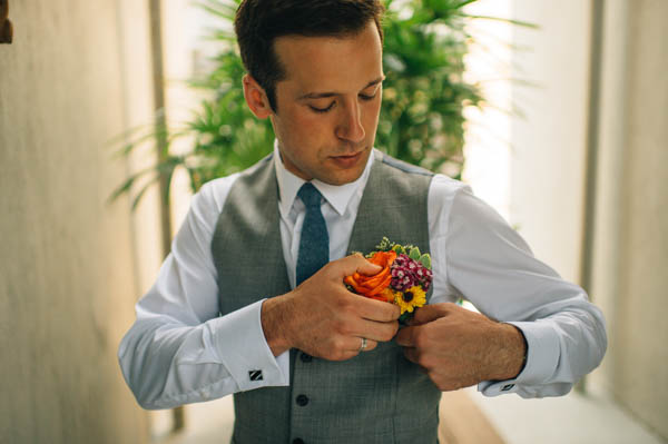 groom's vibrant boutonniere