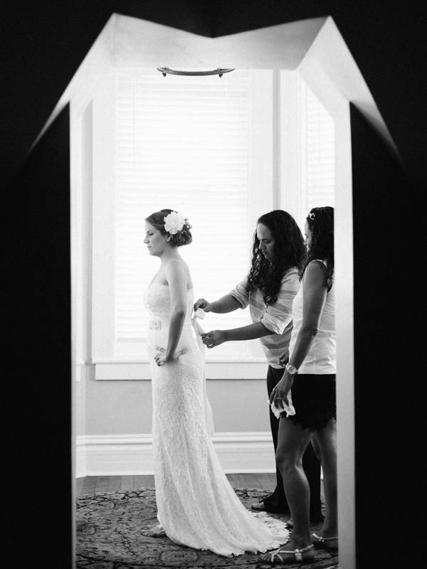 bride getting in her gown