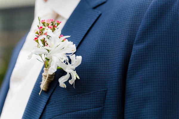 pink and white boutonniere 
