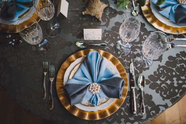 blue and gold table setting