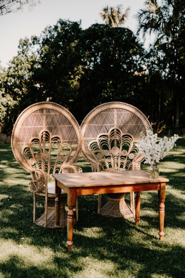 sweetheart table with peacock chairs