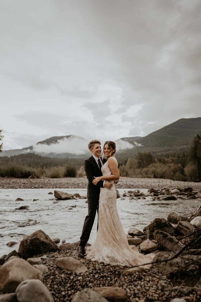 couple on a beach Mount Rainier National Park wedding