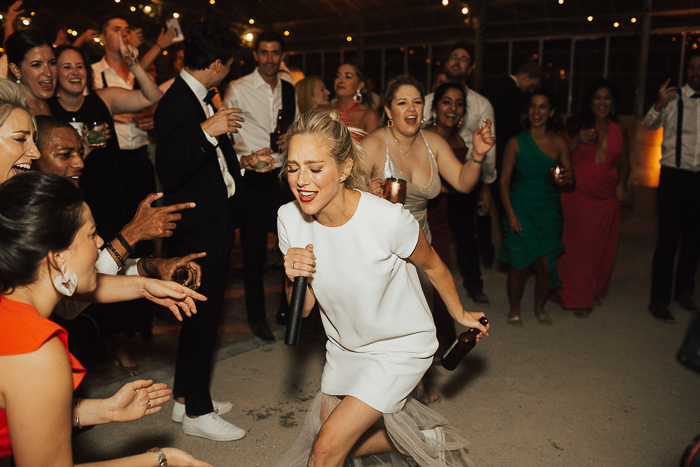 100+ Wedding Entrance Songs to Start the Reception