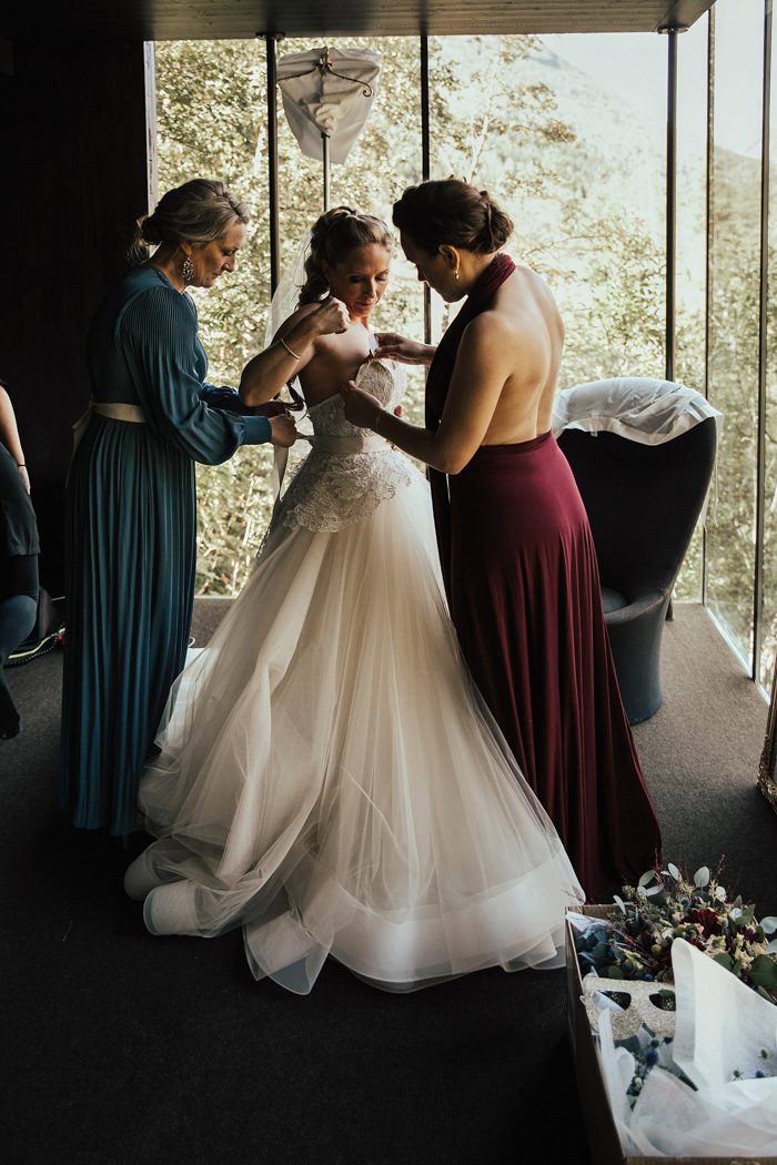 Burgundy and Dusty Blue Norwegian Wedding at Juvet Landscape Hotel