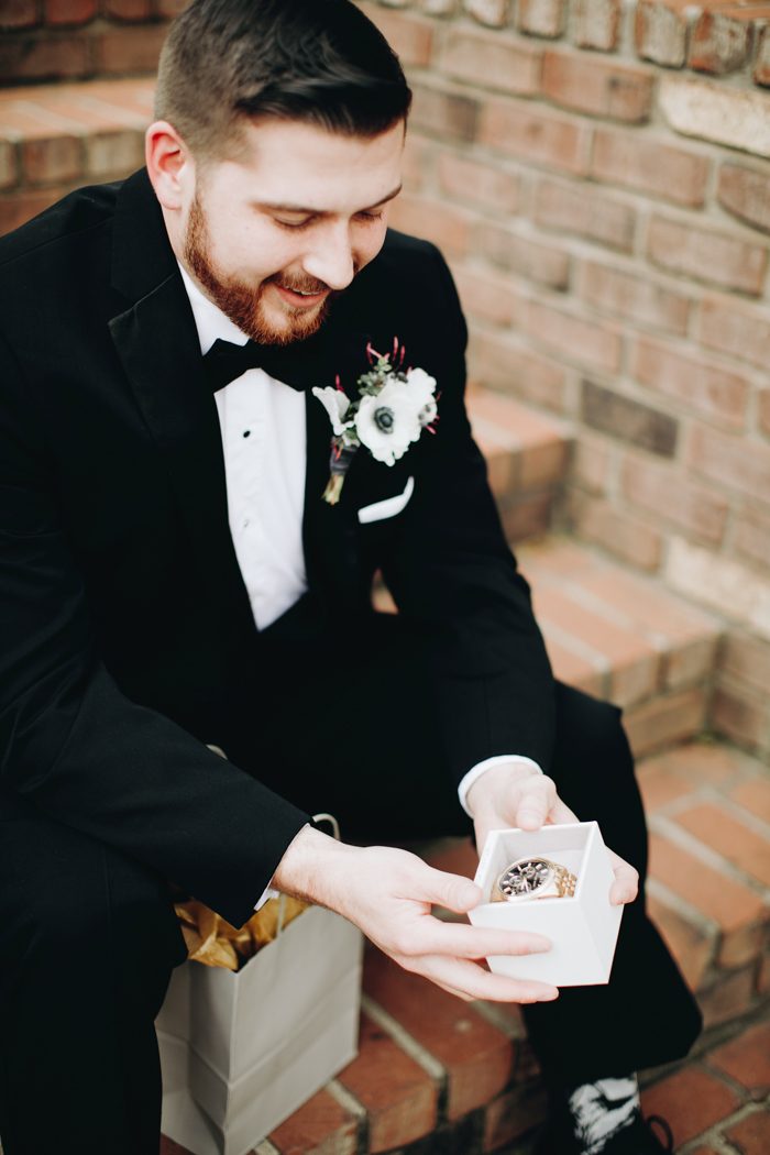 Handsome elegant bearded groom in checkered suit is standing on the bridge  in the forest. Stylish wedding grooms photo in brown leather shoes. Rustic  hipster portrait. 7101260 Stock Photo at Vecteezy