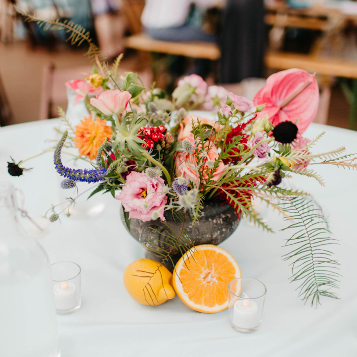 Colorful '70s Boho Wedding at The Greenhouse at Driftwood Junebug