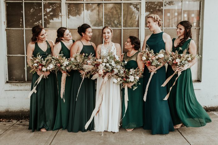 wedding dress with emerald green accents