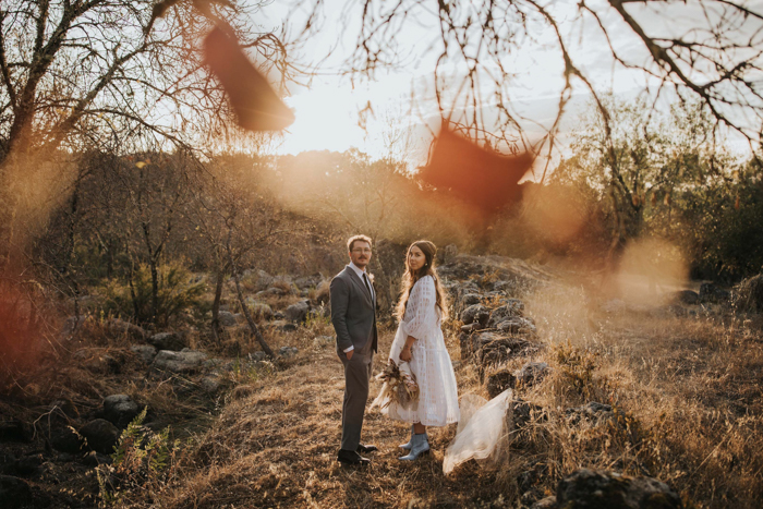 Couple enjoying hillside view, Chas de Egua, Portugal - Stock