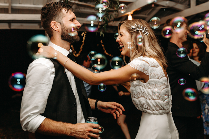 This Wedding Reception Playlist Is Guaranteed To Get Your Guests