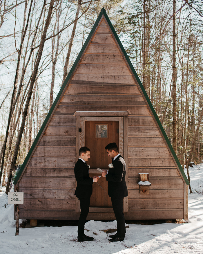 grooms at airbnb wedding exchanging vows