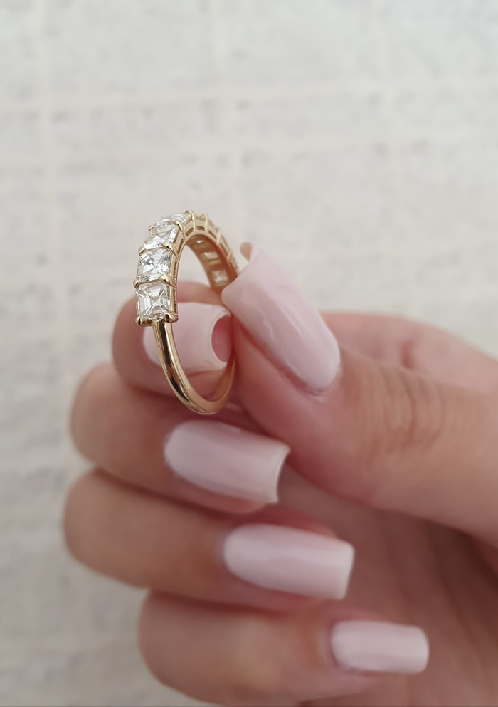 hand holding ring