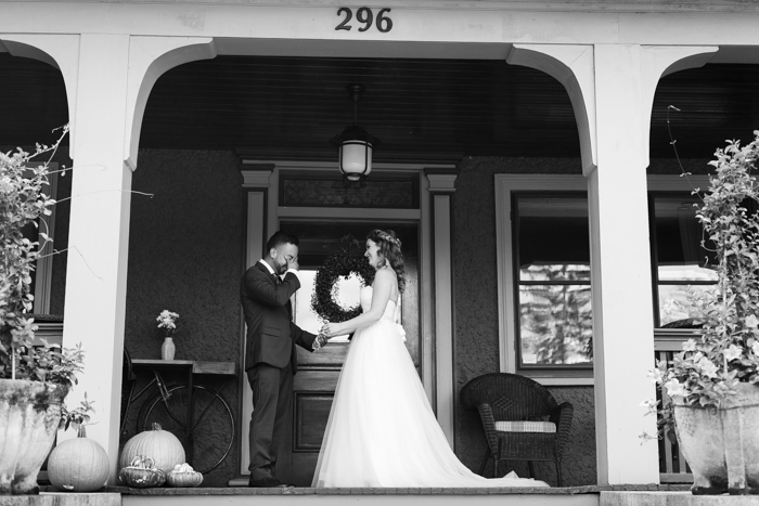 groom kissing bride after first look