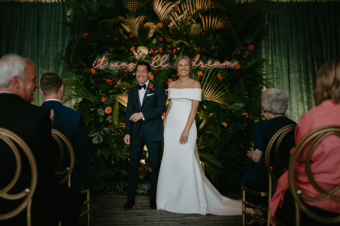 Uniquely Dark Modern Wedding Filled With Lush Greenery *