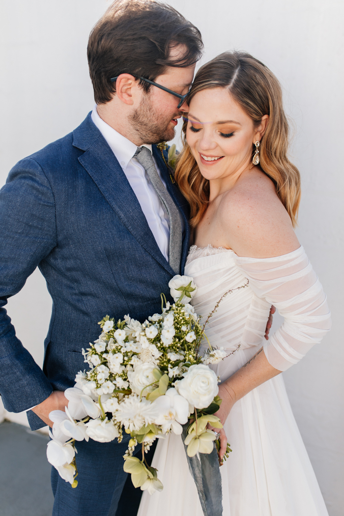 bride and groom with bride bouquet