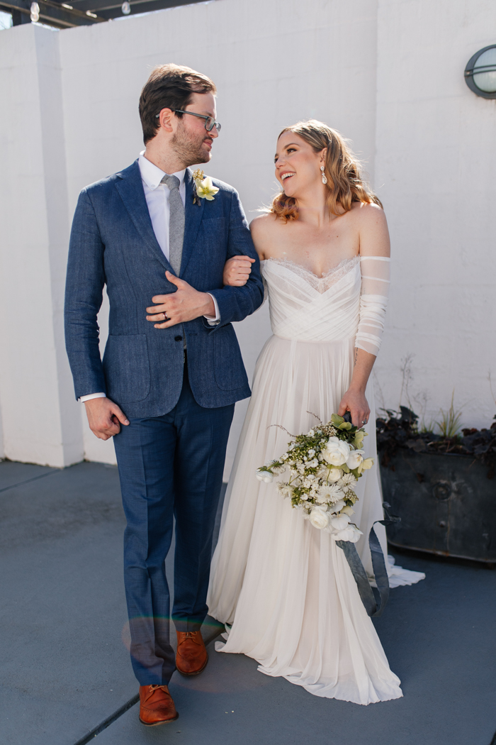 groom and bride walking together