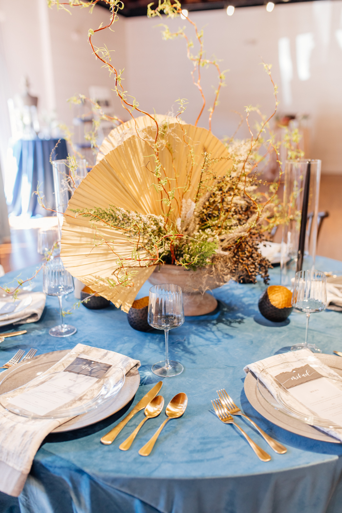 black sand beach wedding table centerpiece