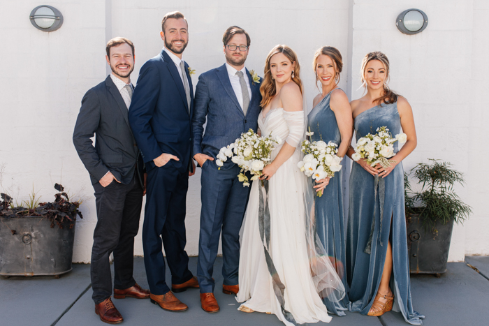 black sand beach wedding party