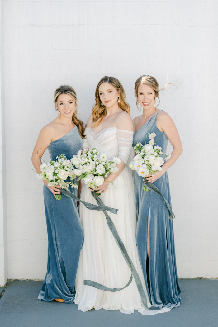 bridal party posing together