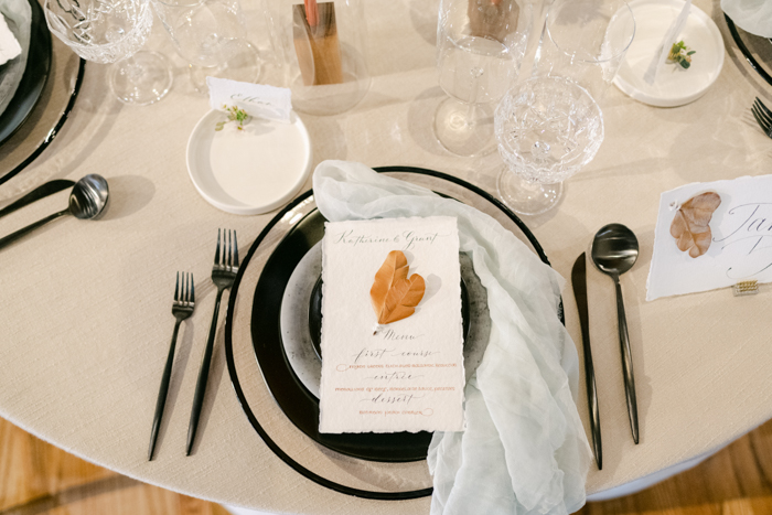 black sand beach wedding place setting