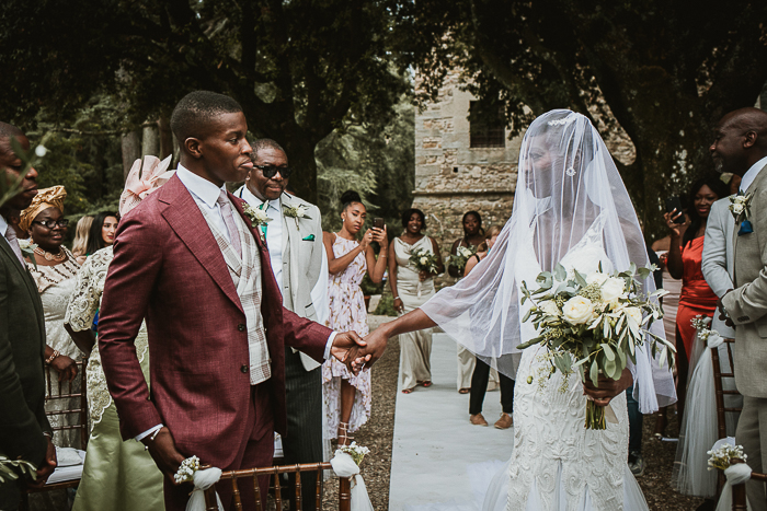 Tuscan Castle Wedding Complete With Rain Showers | Junebug Weddings