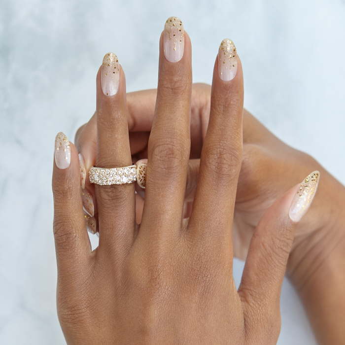 ManiMe manicure shown on hand with wedding ring