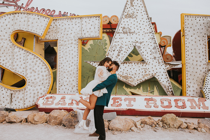 the Neon Boneyard with couple Las Vegas