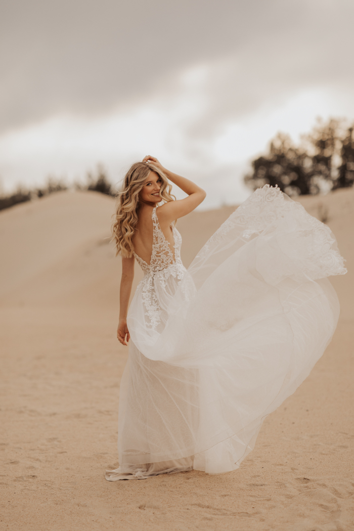 bride on a beach in a wedding gown