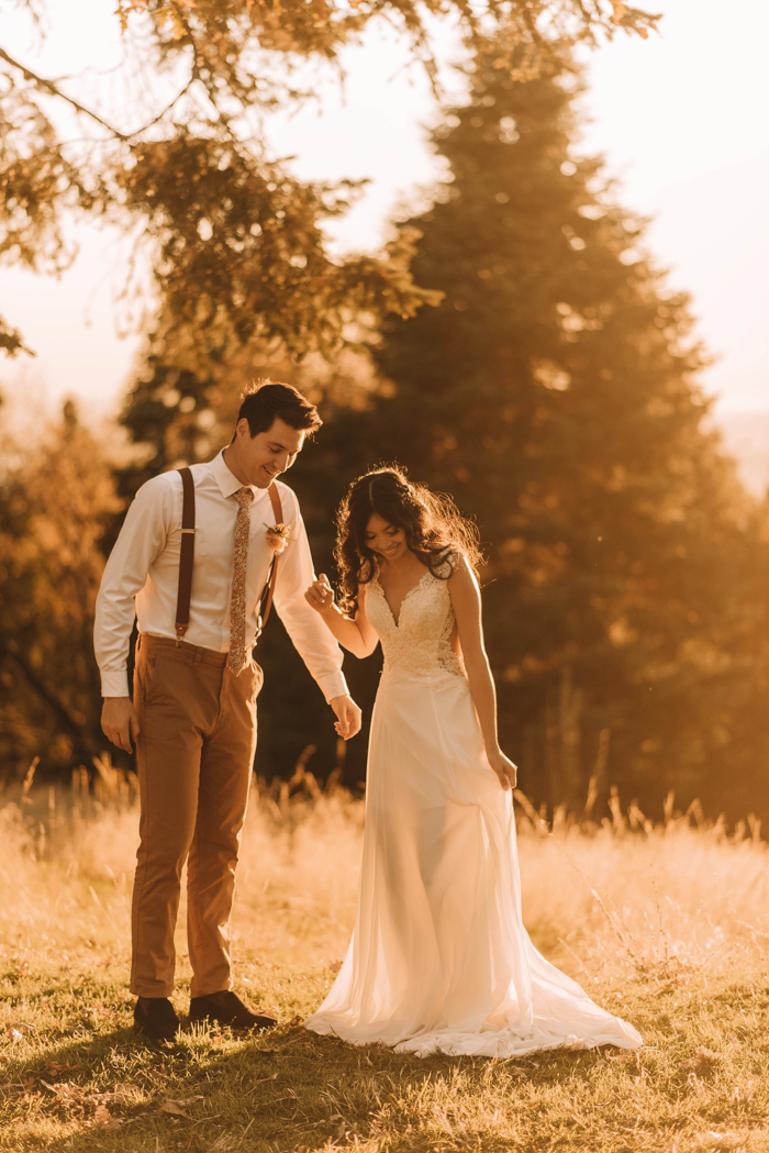 couple walking together bride wearing Kitty affordable wedding dress