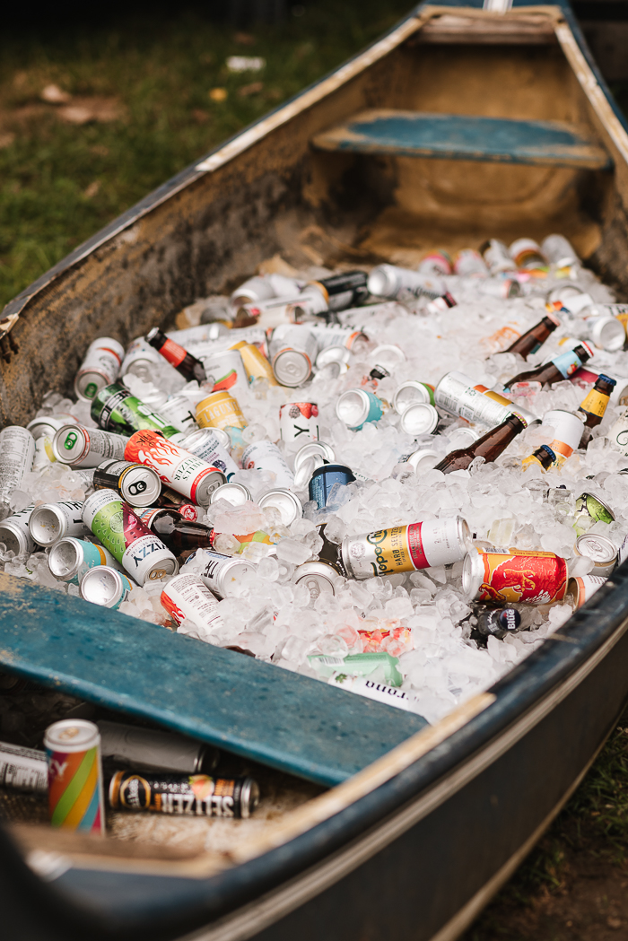 summer camp wedding drink canoe