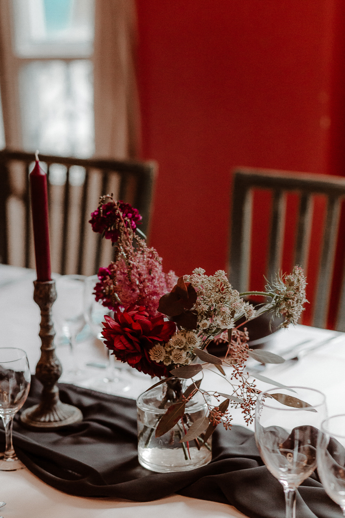 red fall wedding centerpiece