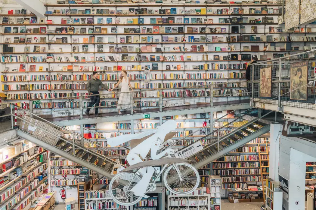 engagement photo in a bookstore