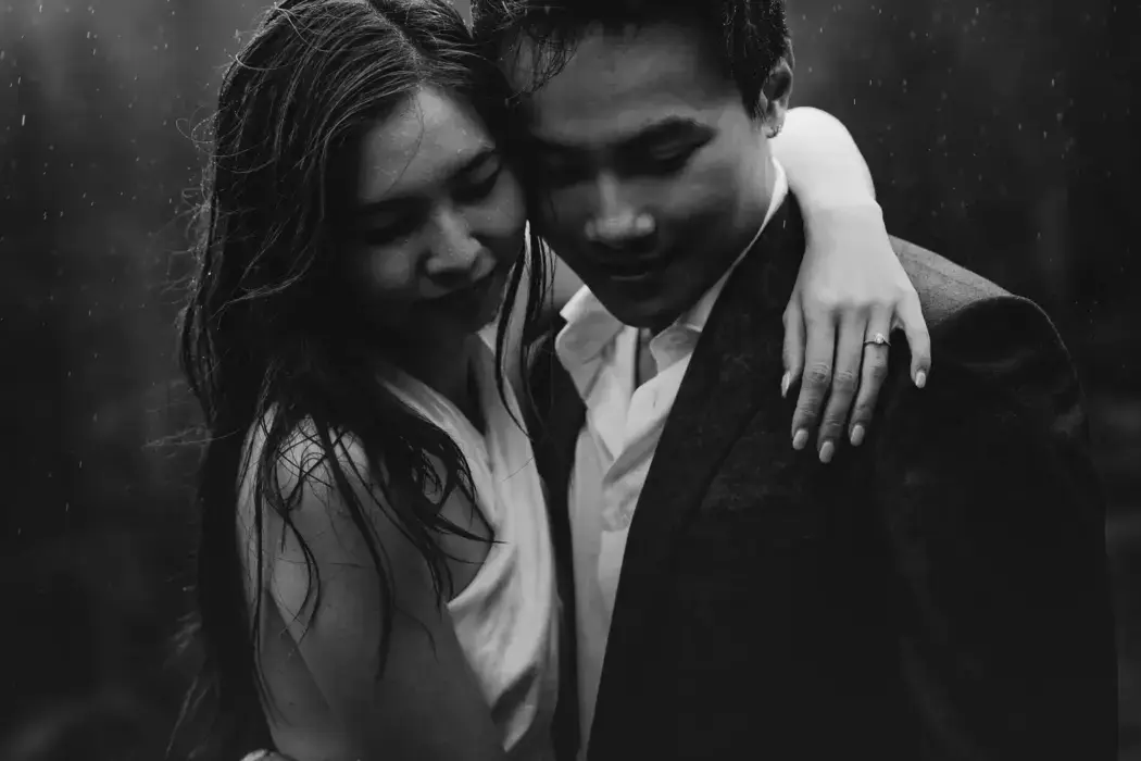 engaged couple in rain