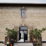 An Enchanted Forest Wedding Full of Moss and Ferns in a Historic Tobacco Warehouse