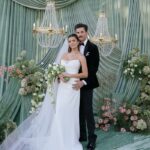 A Dreamy Draped Ceremony Backdrop Anchors This Sage, Ivory, and Blush Wedding Editorial